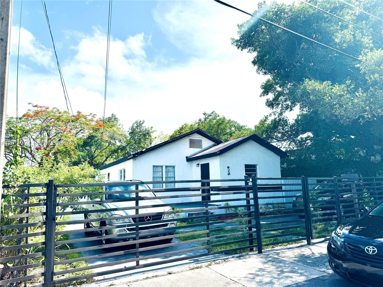 Single-family home at 1484 NW 60th St, Miami, FL