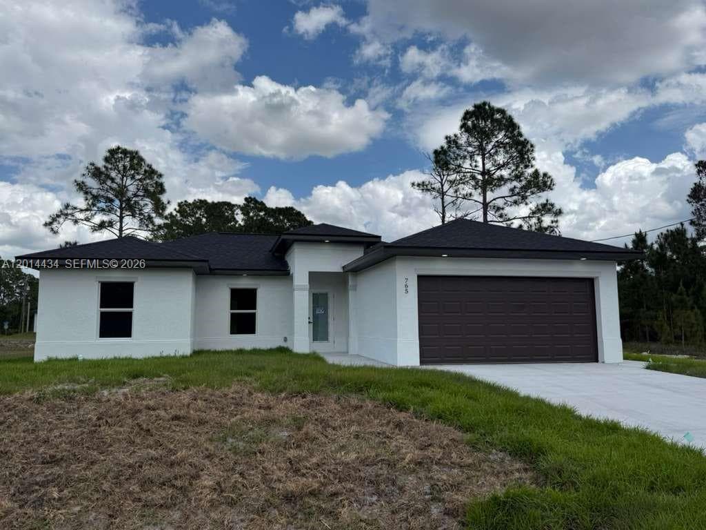 Single-family home at 765 PUCCINI AVE S, Lehigh Acres, FL