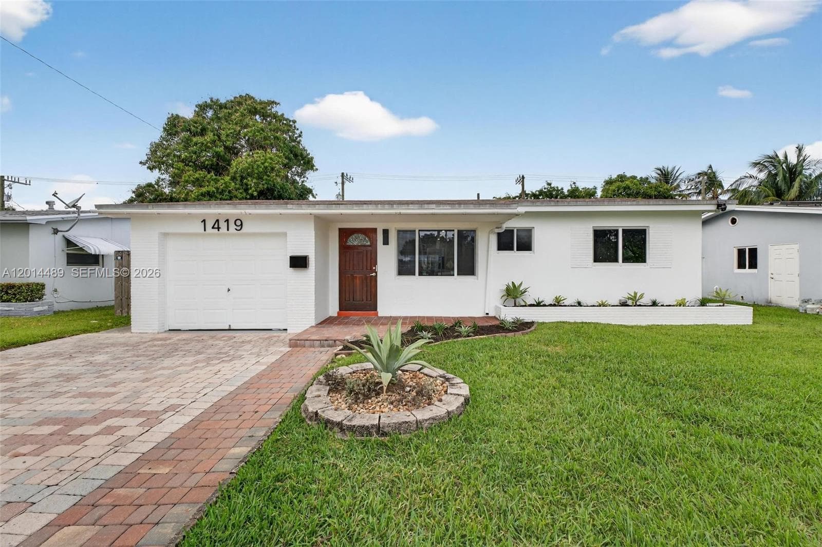 Single-family home at 1419 Harding St, Hollywood — photo 1