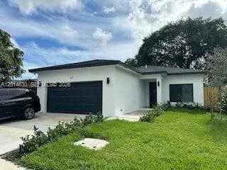 Single-family home at 613 NW 10th St, Hallandale Beach, FL
