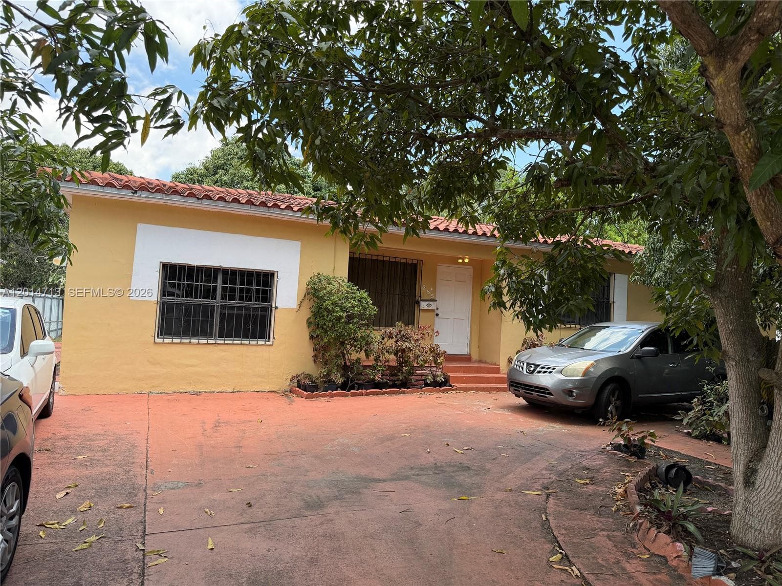 Single-family home at 385 NE 129th St, North Miami — photo 1