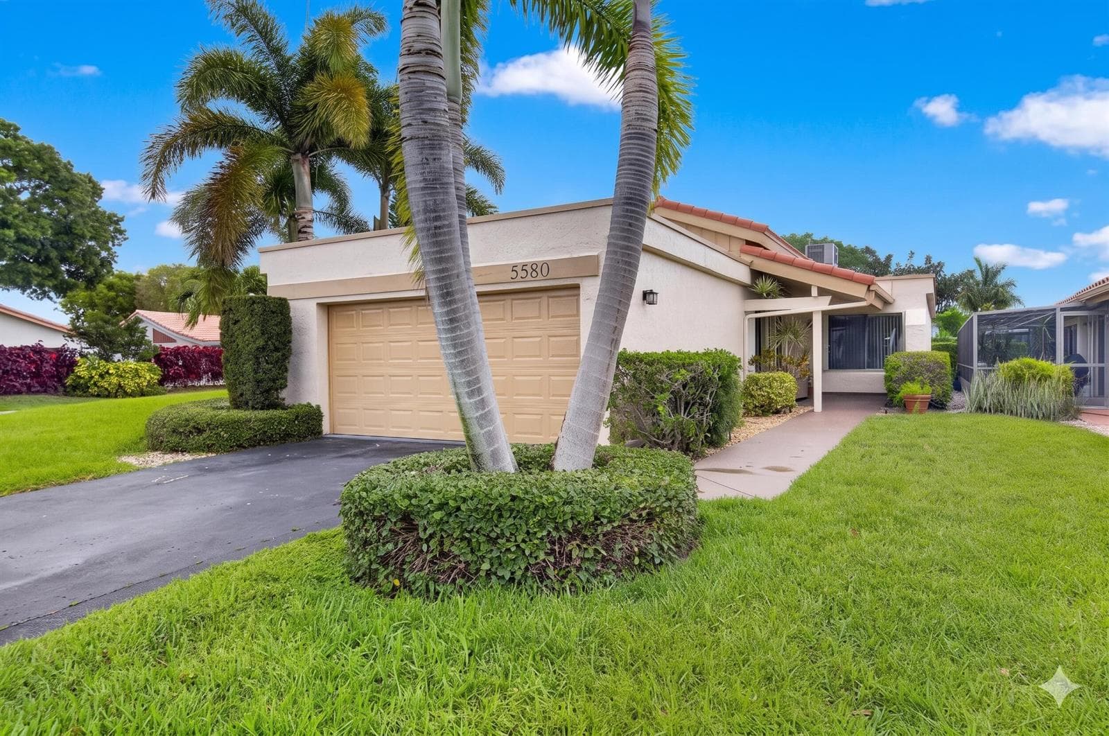 Single-family home at 5580 Piping Rock Drive, Boynton Beach, FL
