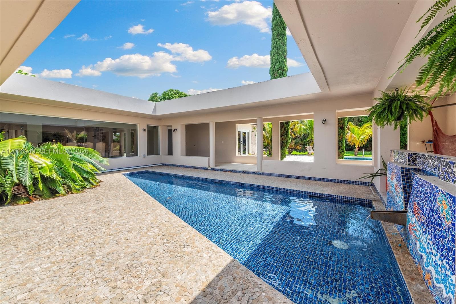 Single-family home at 7650 SW 128th St, Pinecrest, FL