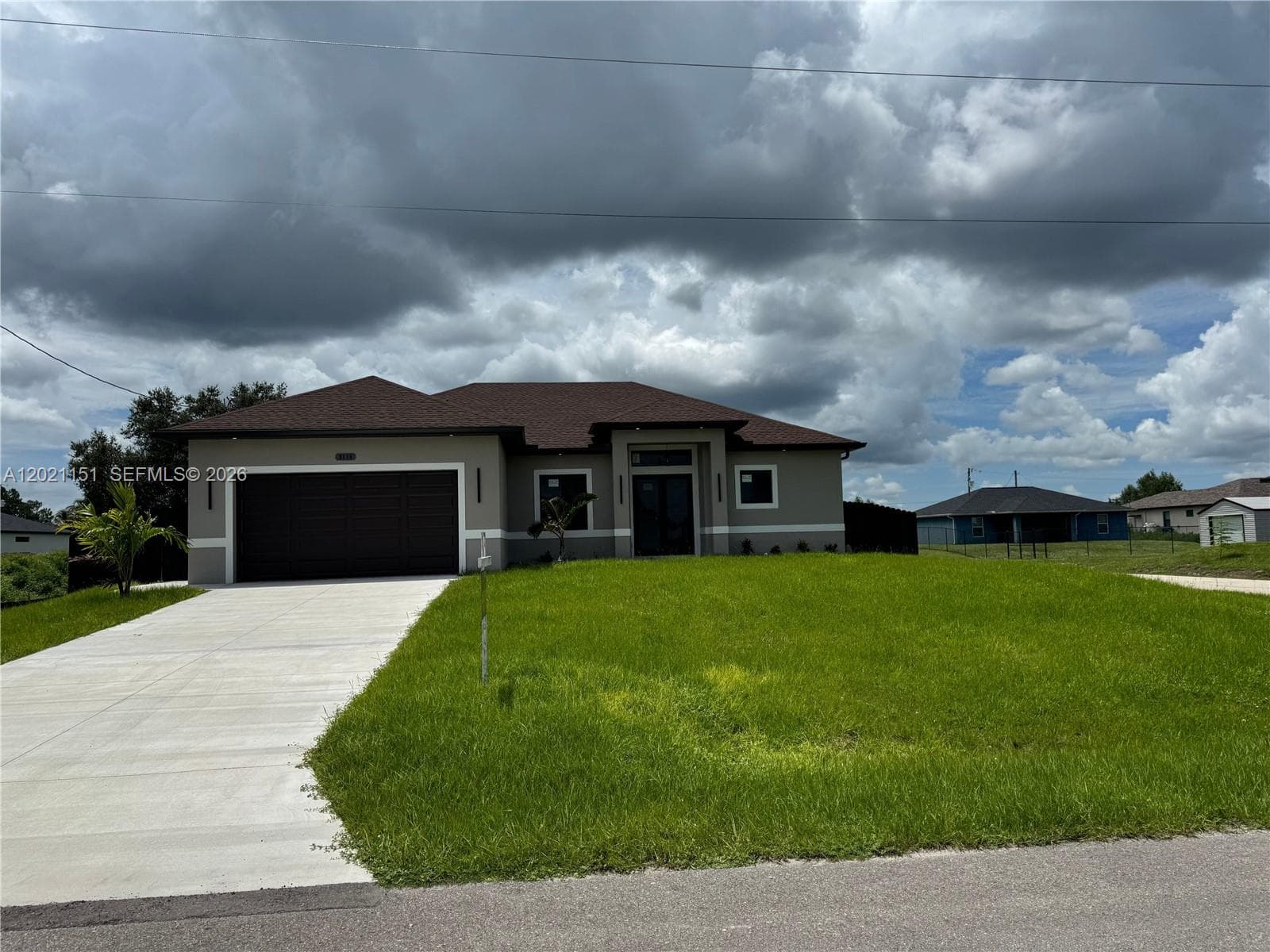 Single-family home at 3115 2nd ST SW, Lehigh Acres, FL