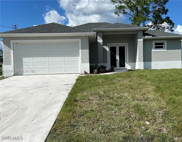 Single-family home at 3304 11 Street west, Lehigh Acres, FL