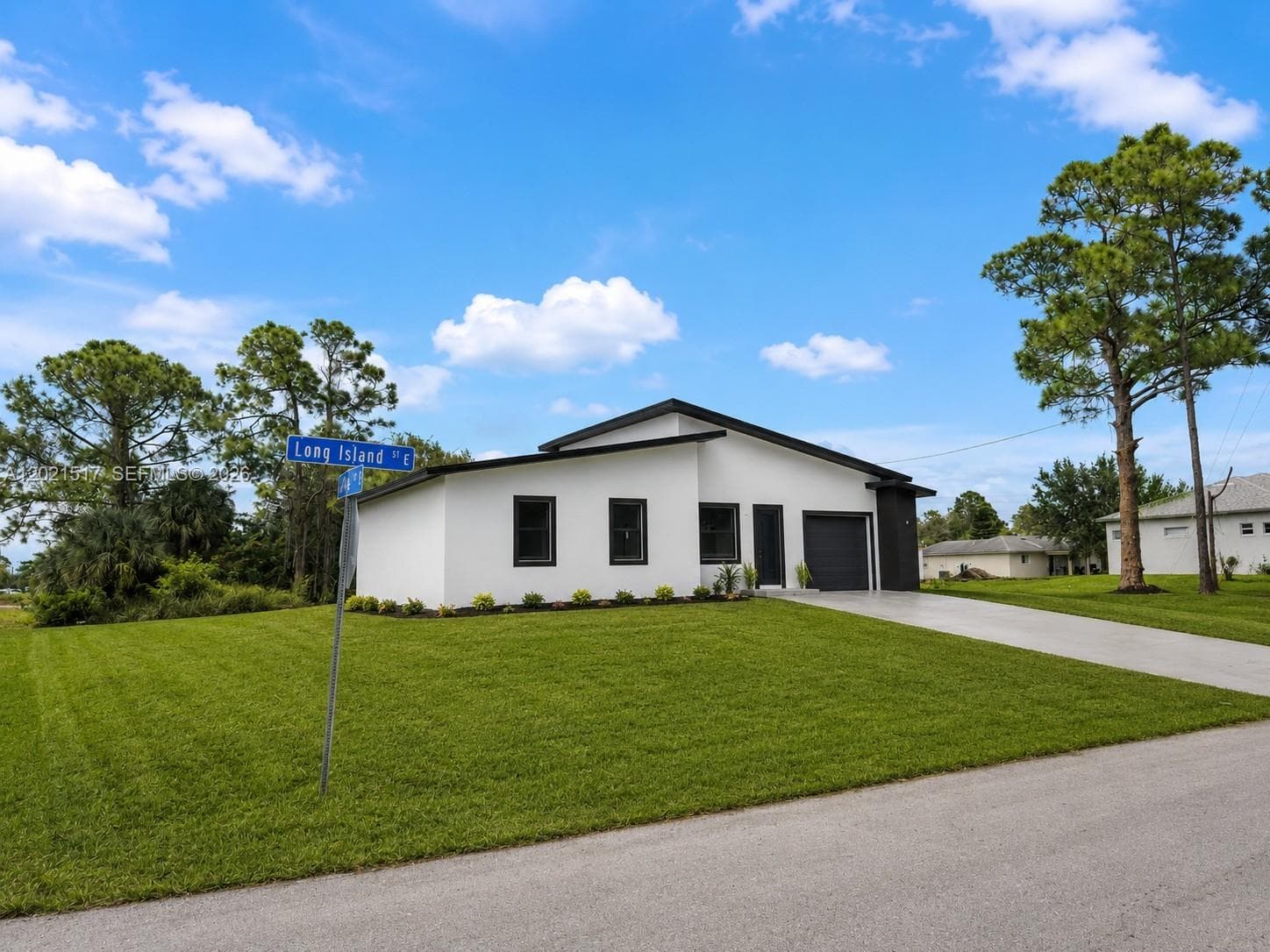 Single-family home at 703 LONG ISLAND, Lehigh Acres, FL