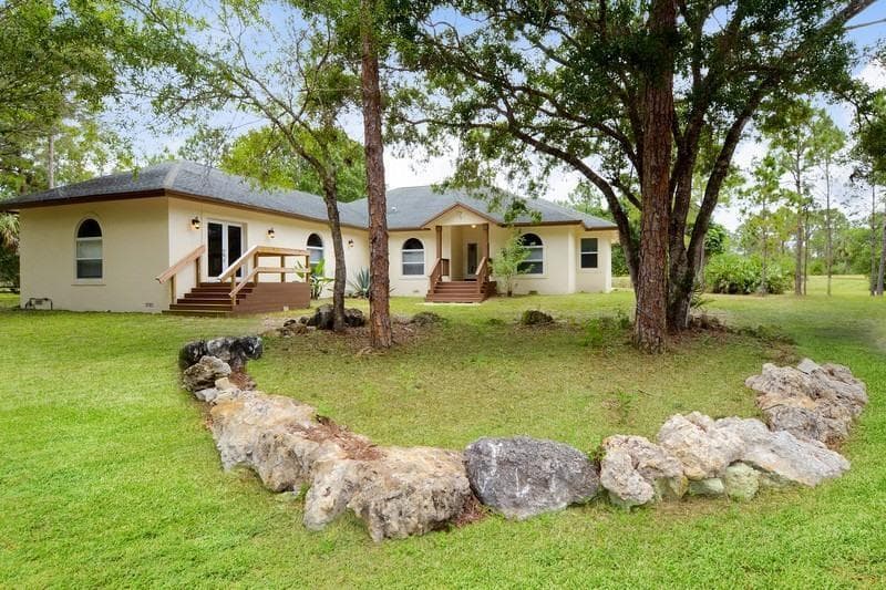 Single-family home at 4935 Lame Panther Lane, Loxahatchee, FL