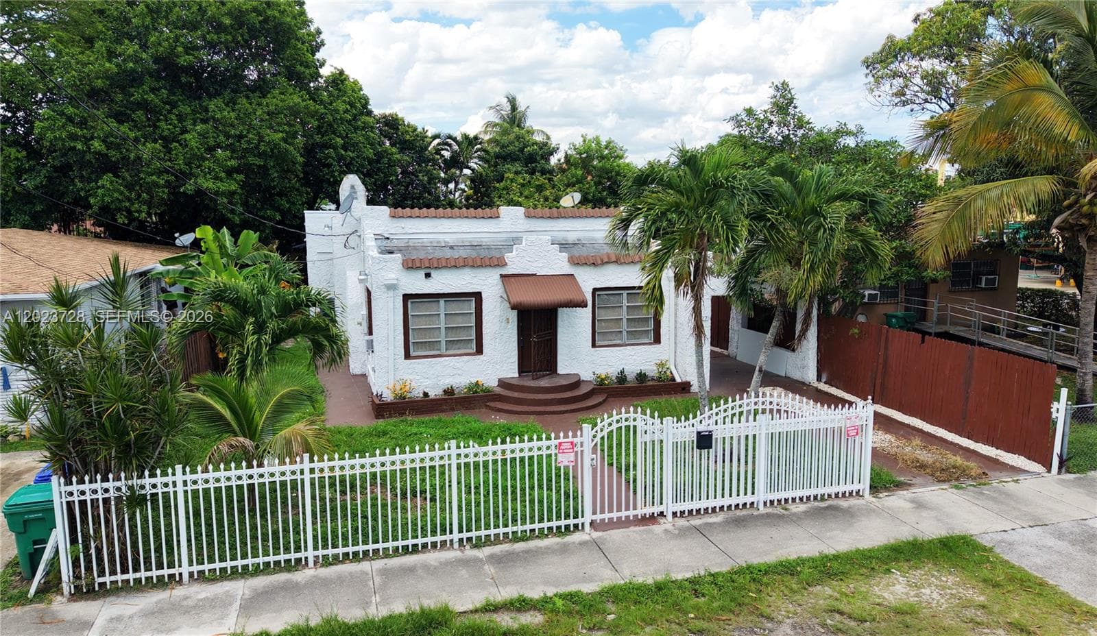 Single-family home at 1727 NW 50th St, Miami — photo 1