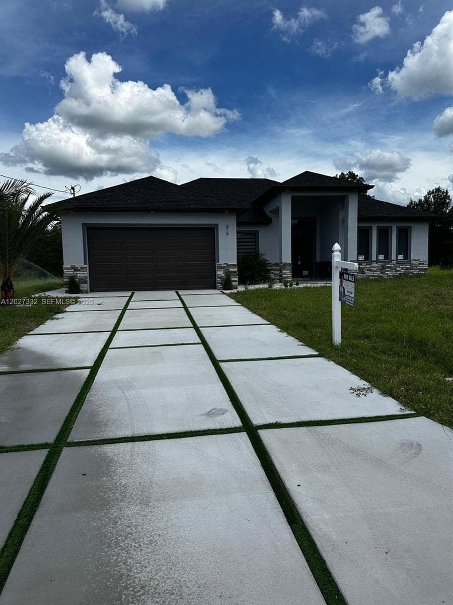 Single-family home at 616 Maple Ave N, Lehigh Acres — photo 1