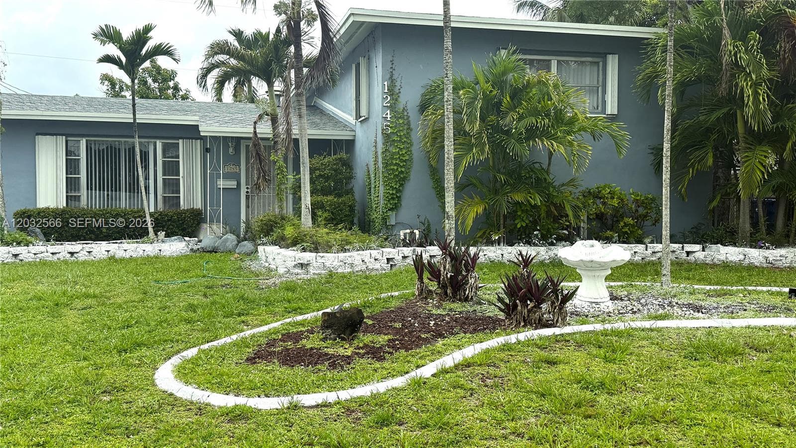 Single-family home at 1245 NE 203rd St, Miami — photo 1