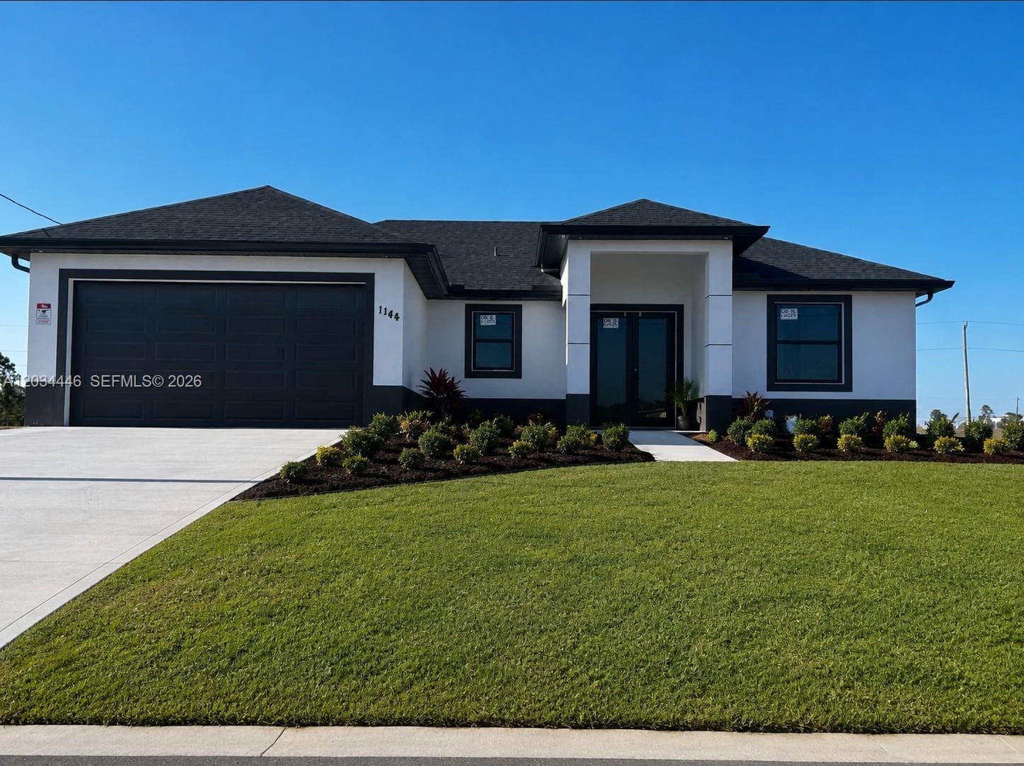 Single-family home at 1144 Ecstasy ST E, Lehigh Acres — photo 1