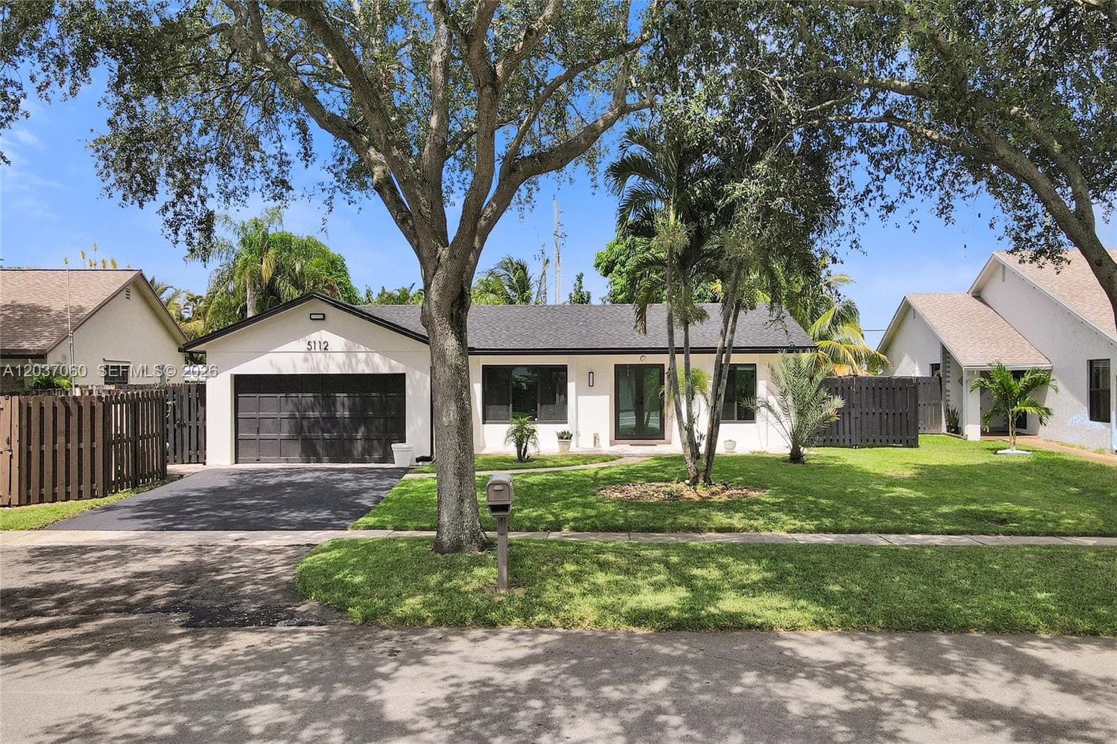 Single-family home at 5112 SW 87th Ave, Cooper City, FL