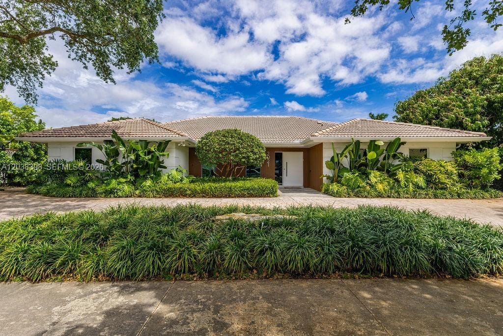 Single-family home at 2021 NE 212th St, Miami, FL