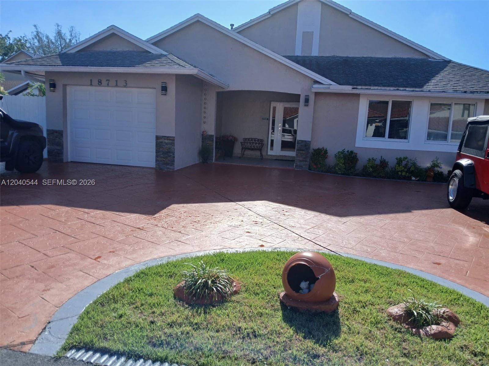 Single-family home at 18713 NW 78th Ct, Hialeah, FL