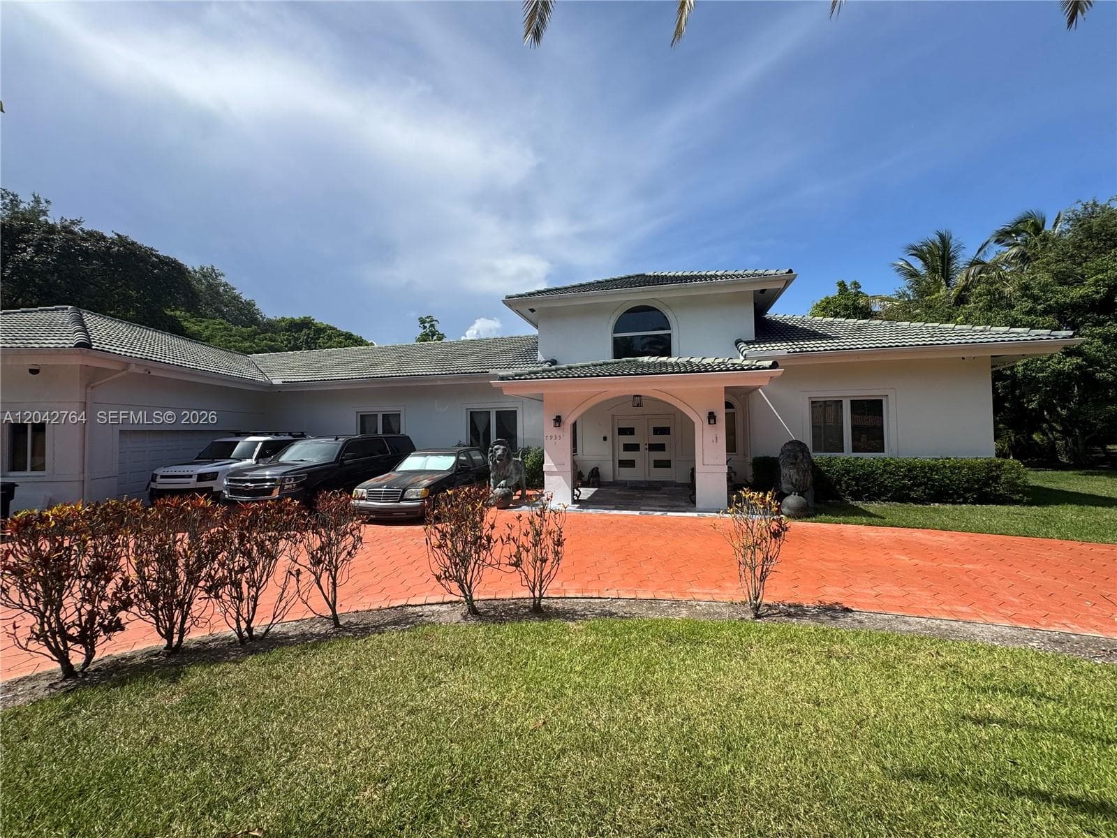 Single-family home at 7935 SW 128th St, Pinecrest, FL