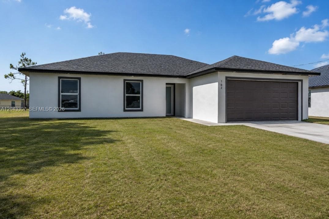 Single-family home at 702 carbon st, Lehigh Acres, FL