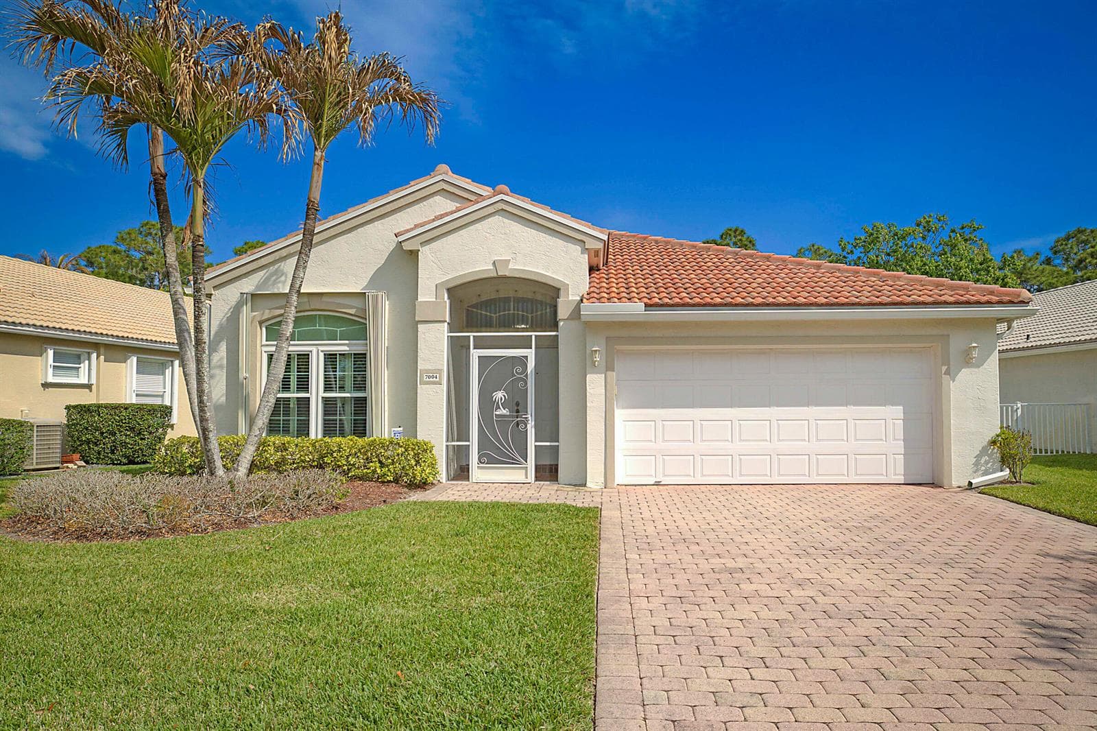Single-family home at 7004 SE Twin Oaks Circle, Stuart, FL