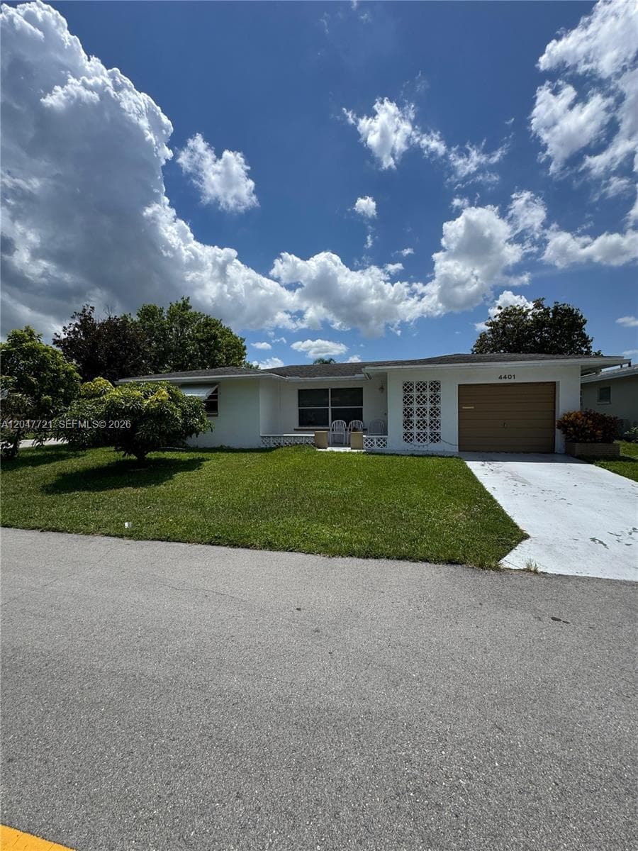 Single-family home at 4401 NW 43rd Ter, Tamarac, FL