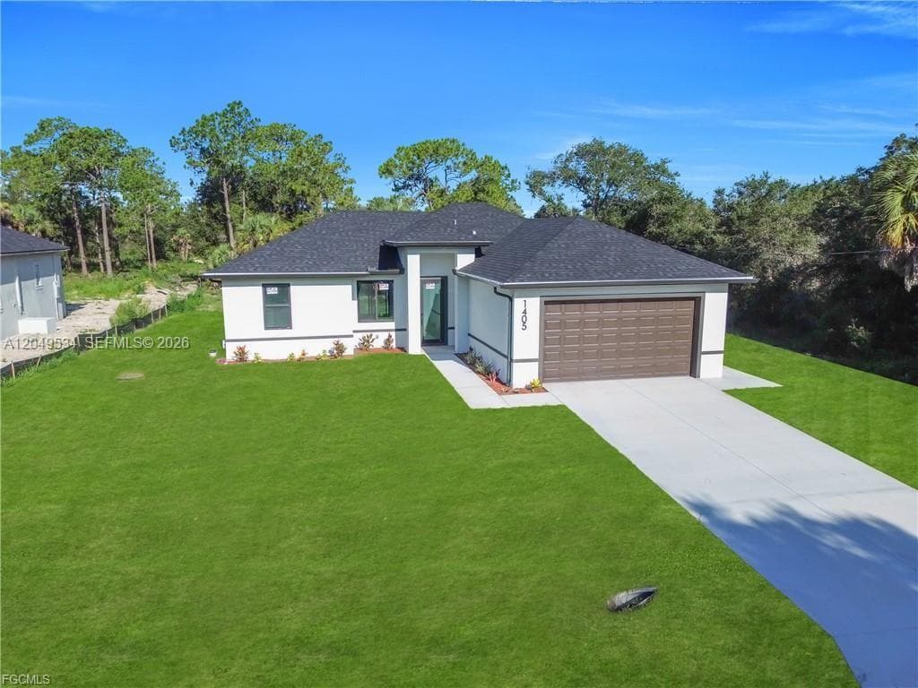 Single-family home at 1405 Palmetto Ave, Lehigh Acres, FL