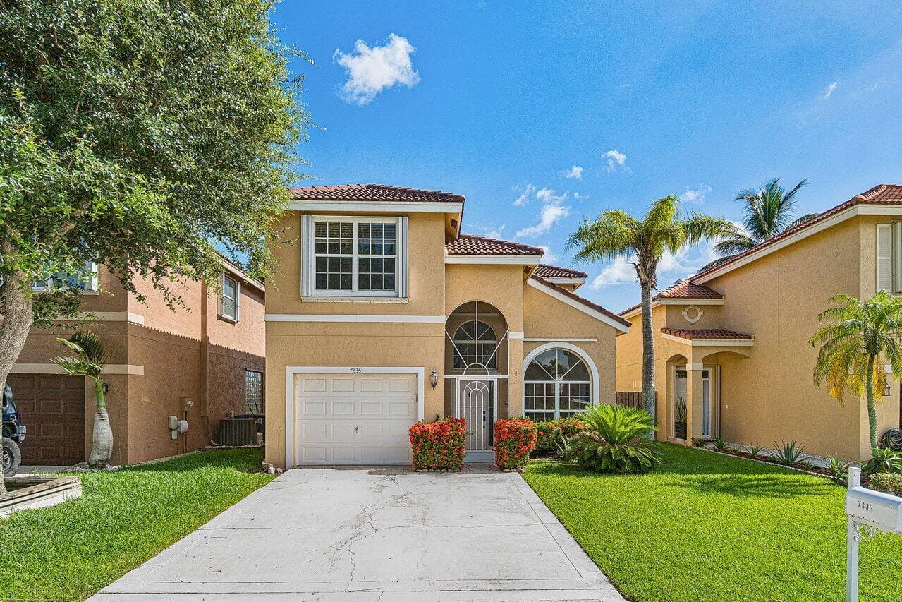 Single-family home at 7835 Springfield Lake Drive, Lake Worth, FL
