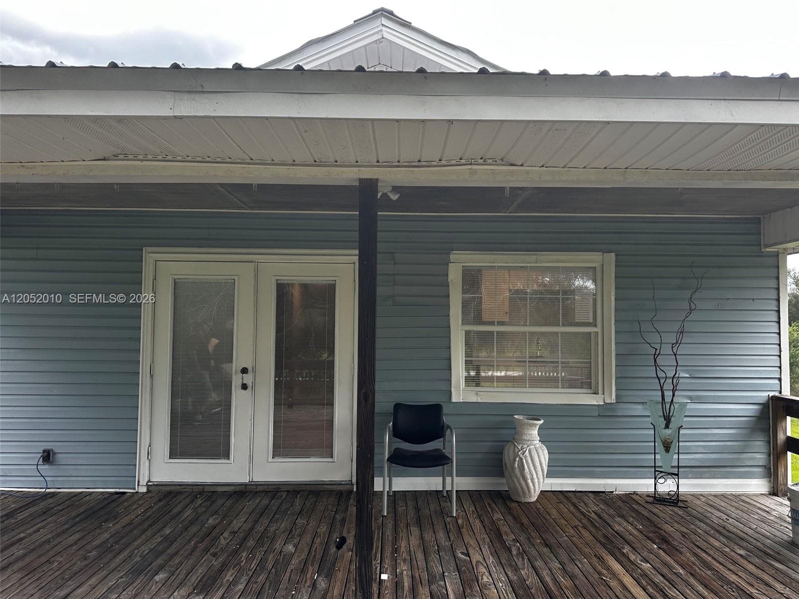 Single-family home at 450 N ISORA, Clewiston, FL