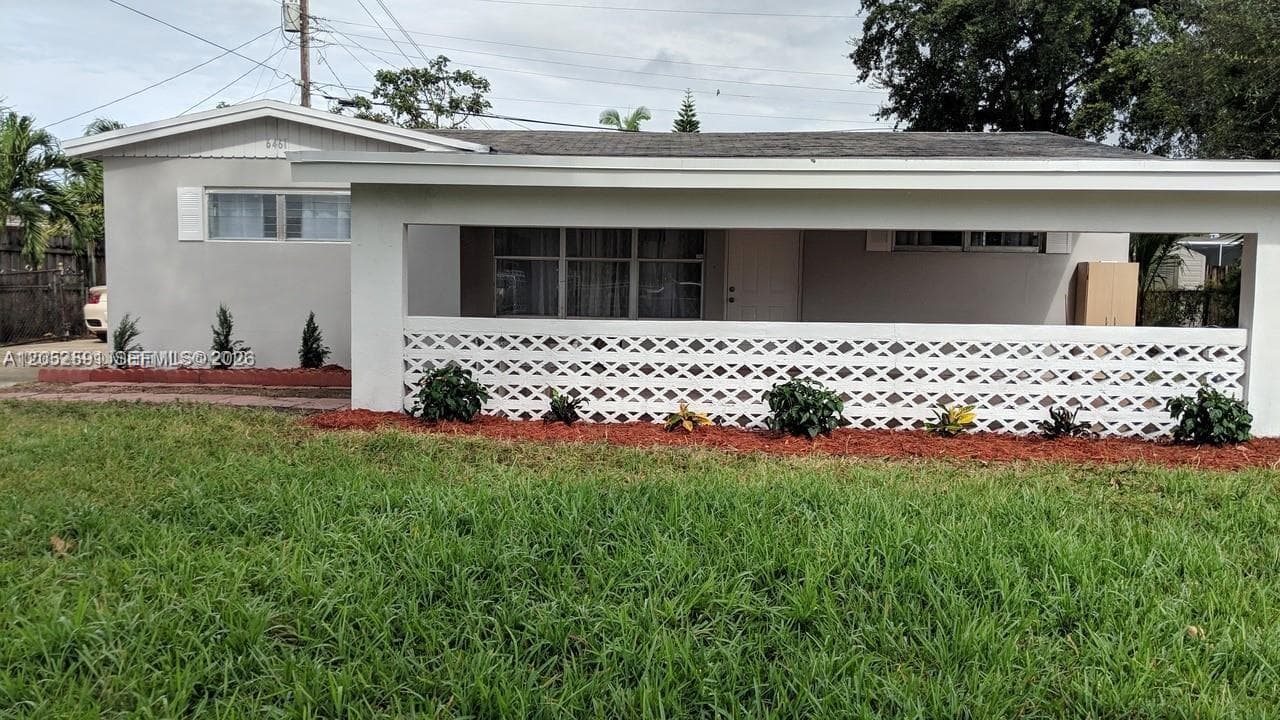 Single-family home at 6461 Evans St, Hollywood — photo 1