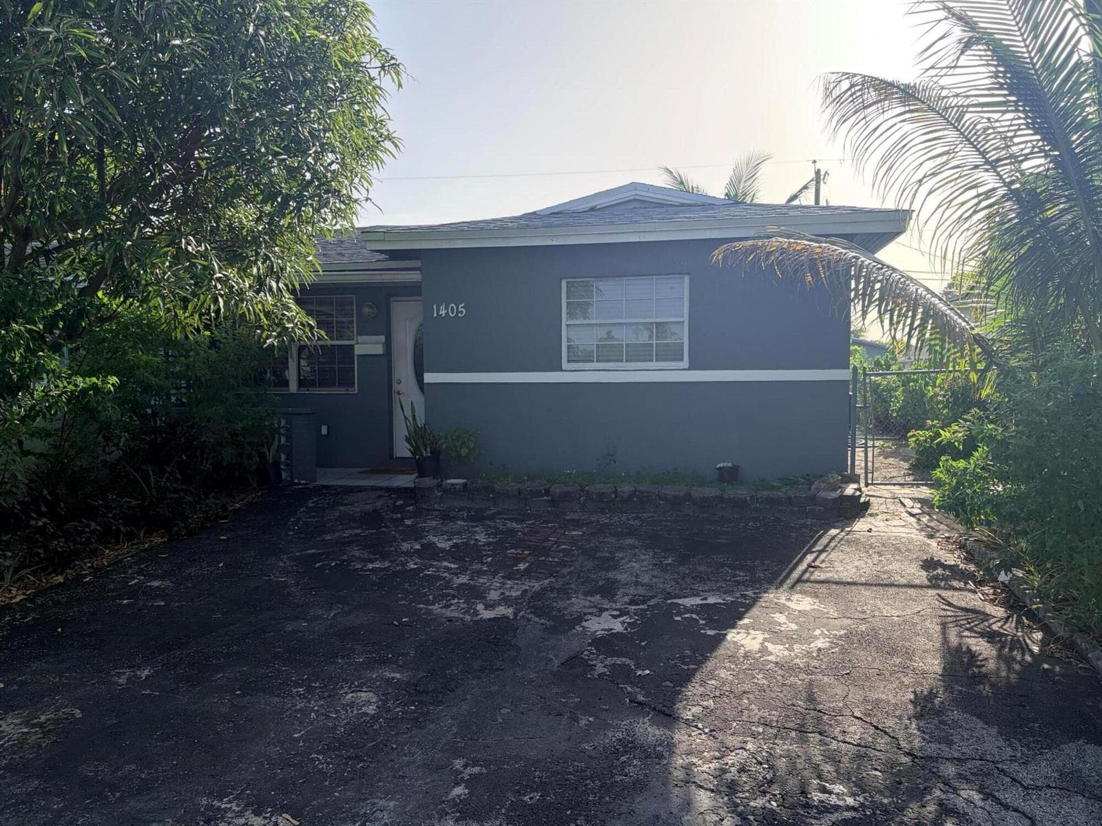 Single-family home at 1405 NW 58TH Avenue, Lauderhill, FL