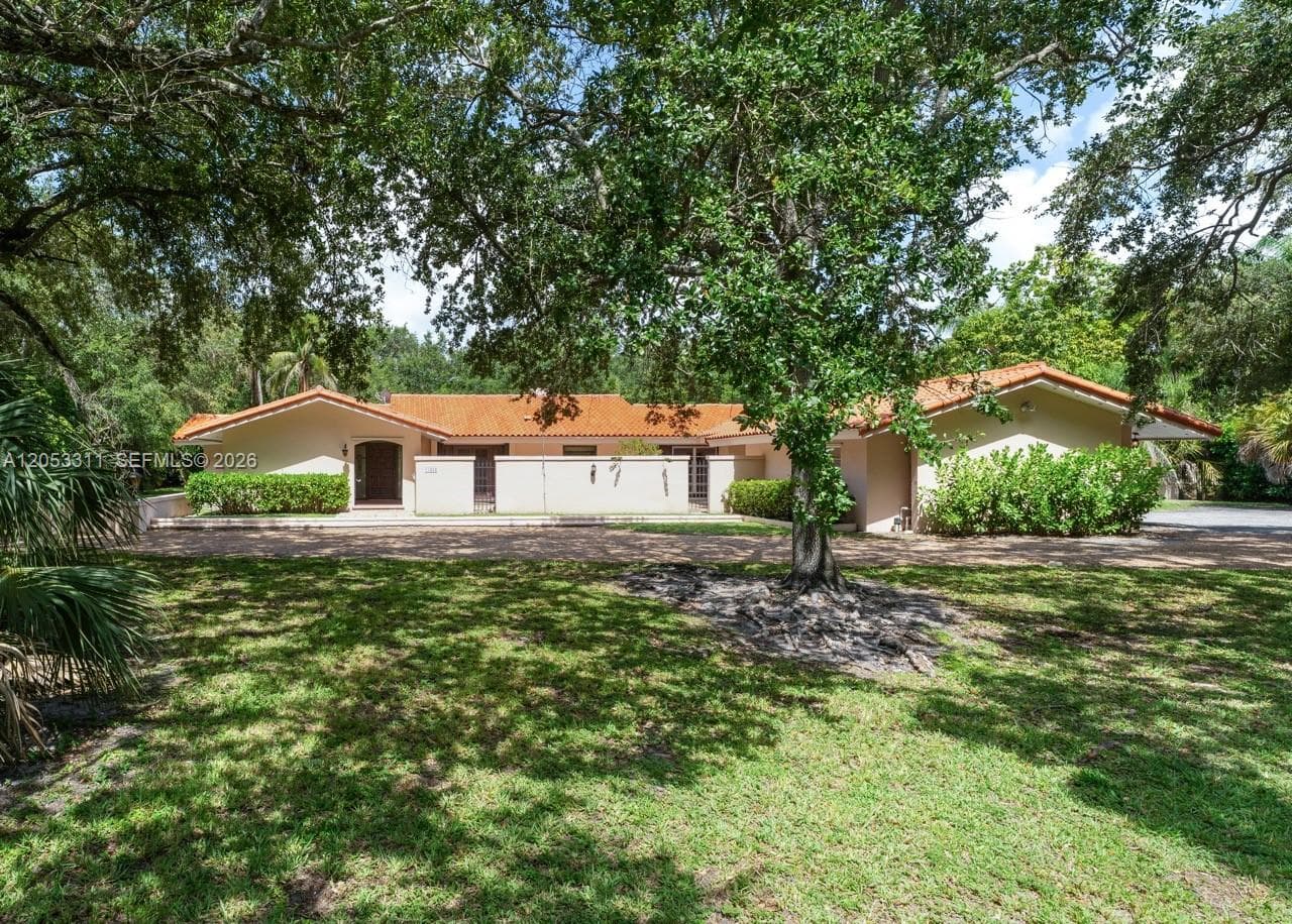 Single-family home at 11950 SW 67 Ct, Pinecrest, FL