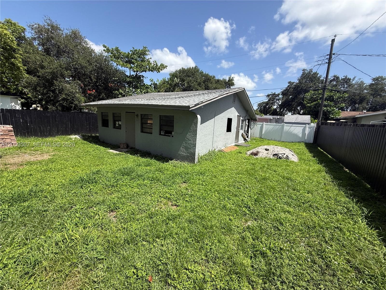 Single-family home at 6123 Call St, Hollywood, FL