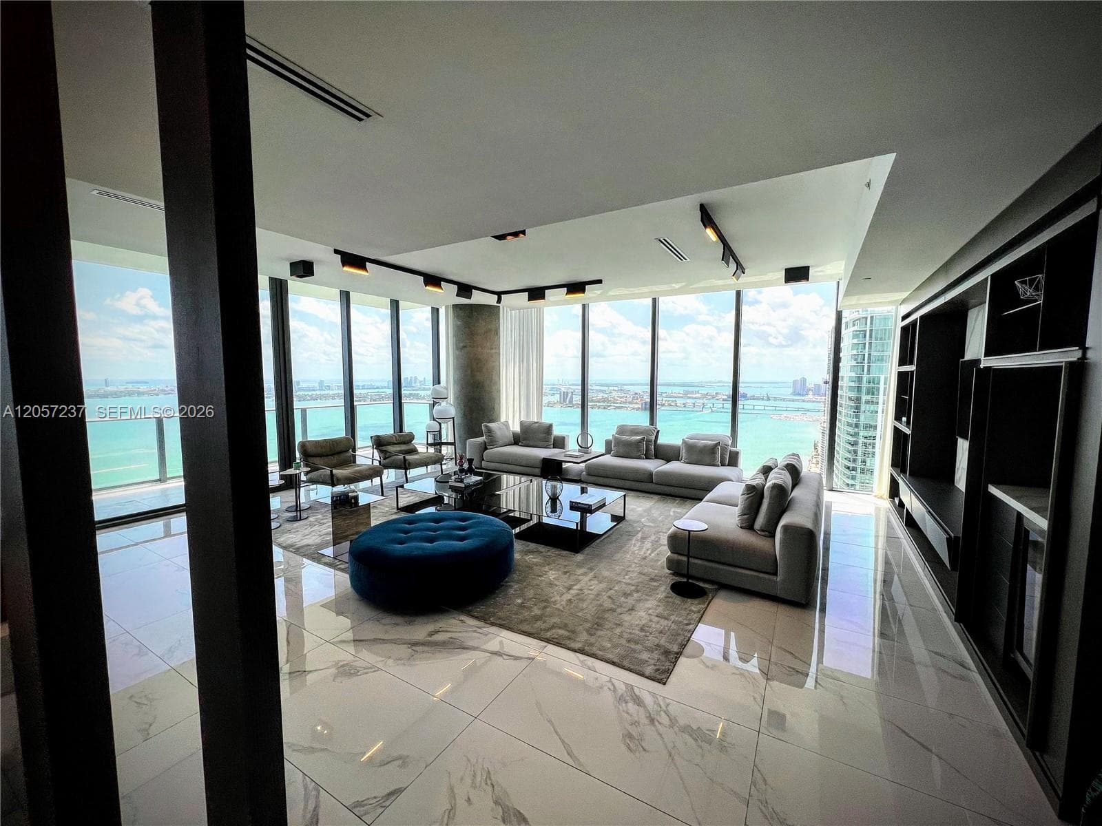 Expanded living room, high end built ins