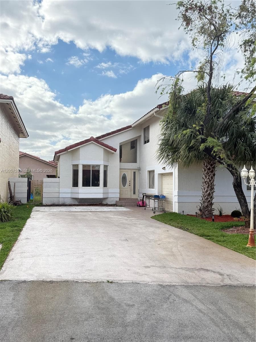 Single-family home at 18318 NW 61st Ct, Hialeah, FL