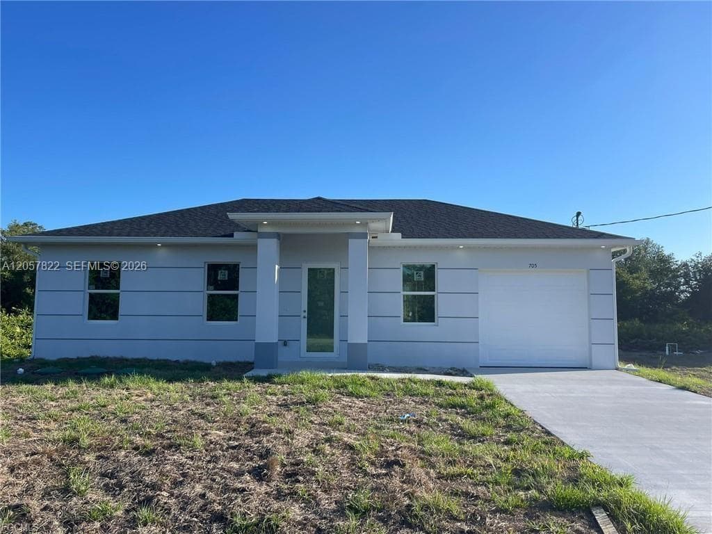 Single-family home at 705 Ledge ST, Lehigh Acres, FL