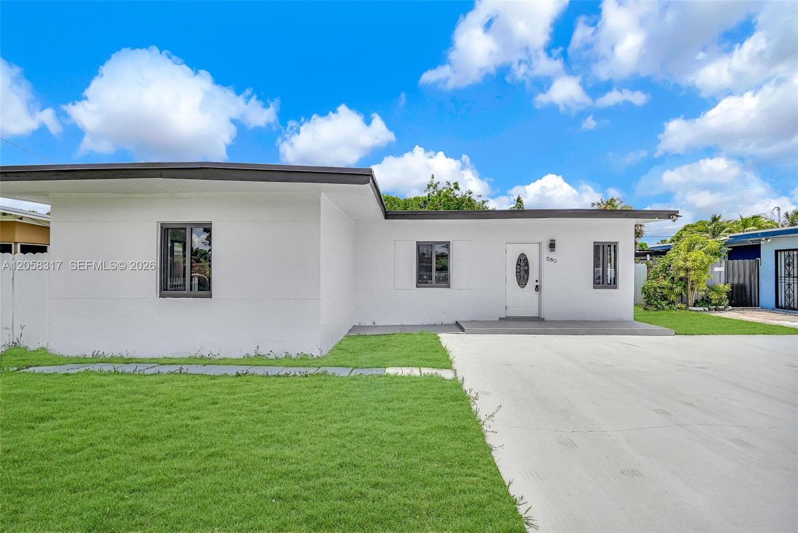 Single-family home at 580 NW 116th Ter, Miami — photo 1