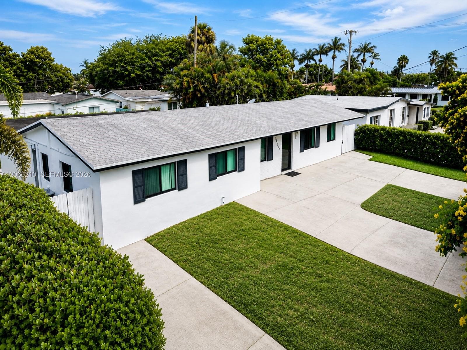 Single-family home at 18150 NW 82nd Ave, Hialeah, FL