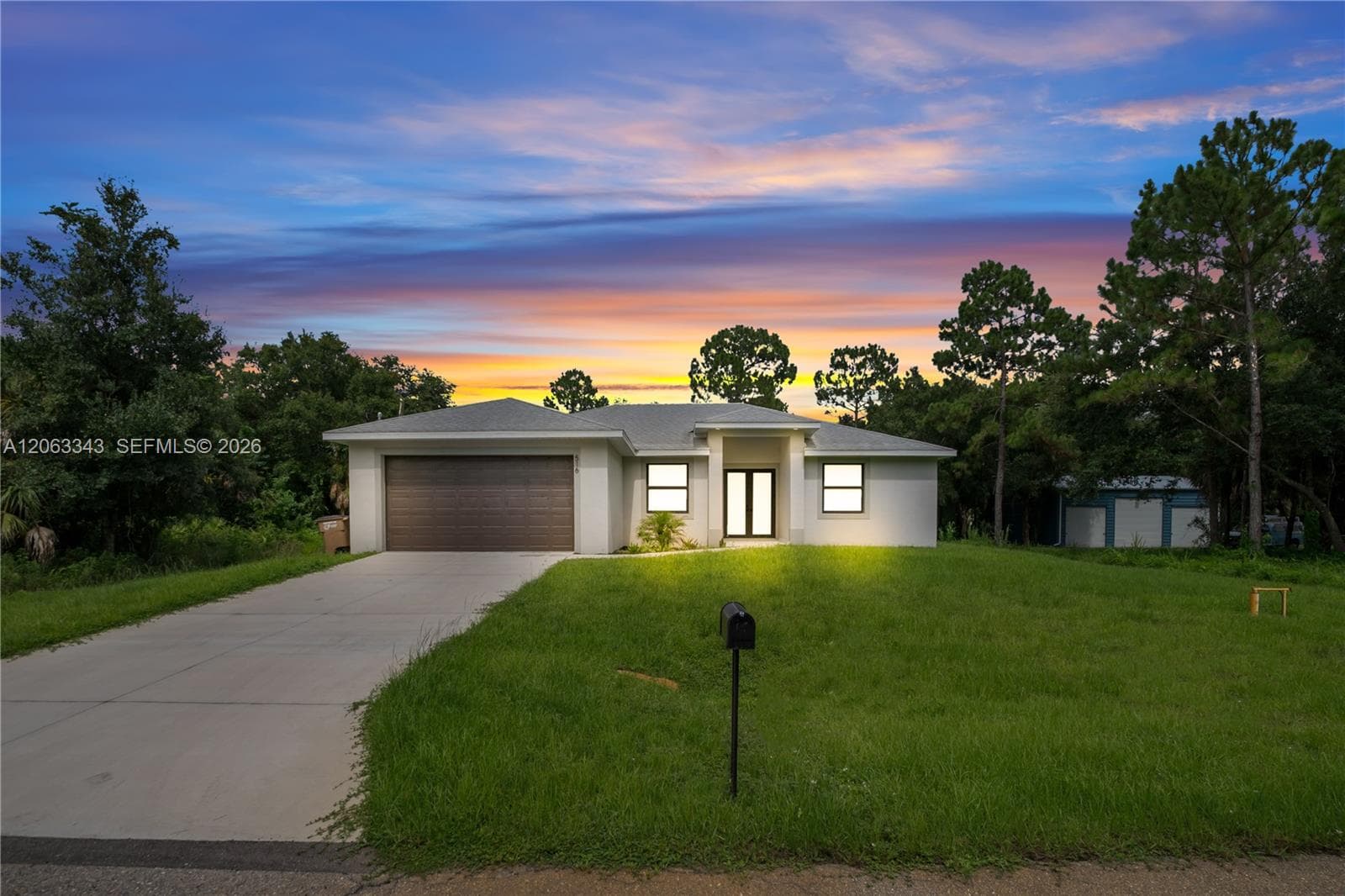 Single-family home at 516 DAYTON AVE, Lehigh Acres, FL