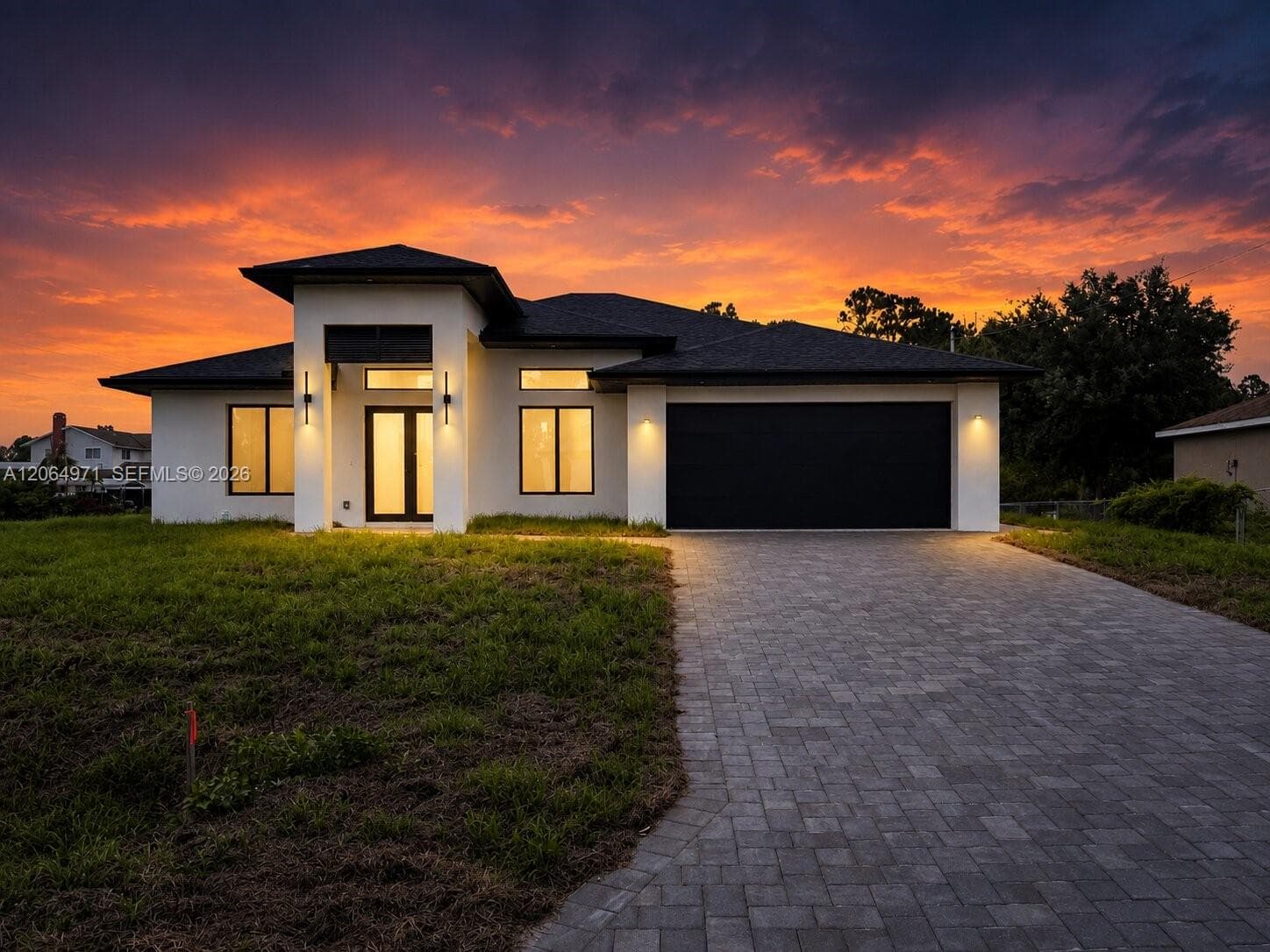 Single-family home at 705 Colyer St E, Lehigh Acres — photo 1
