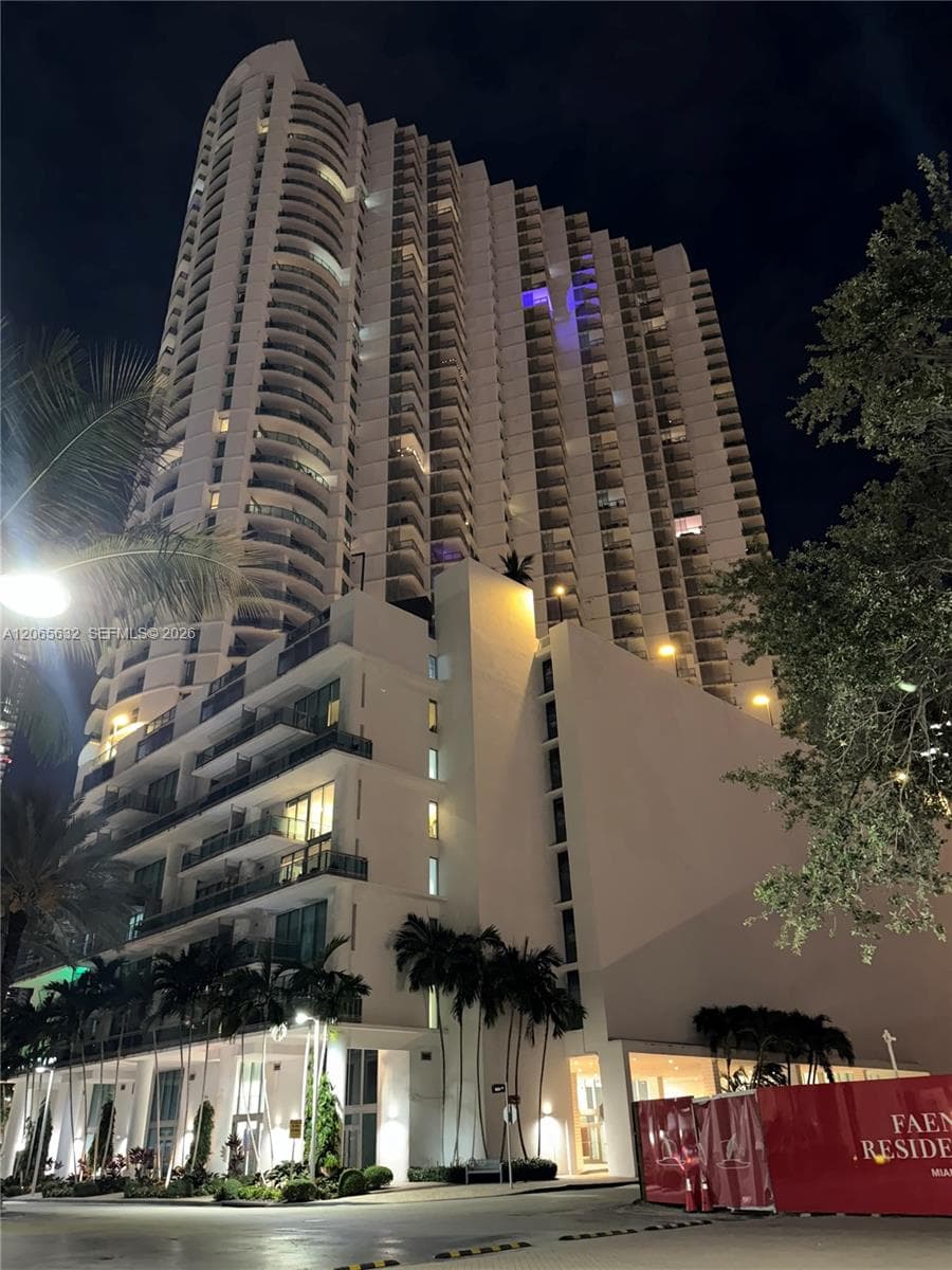 Front exterior of Wind Residences, modern high rise architecture and contemporary design
