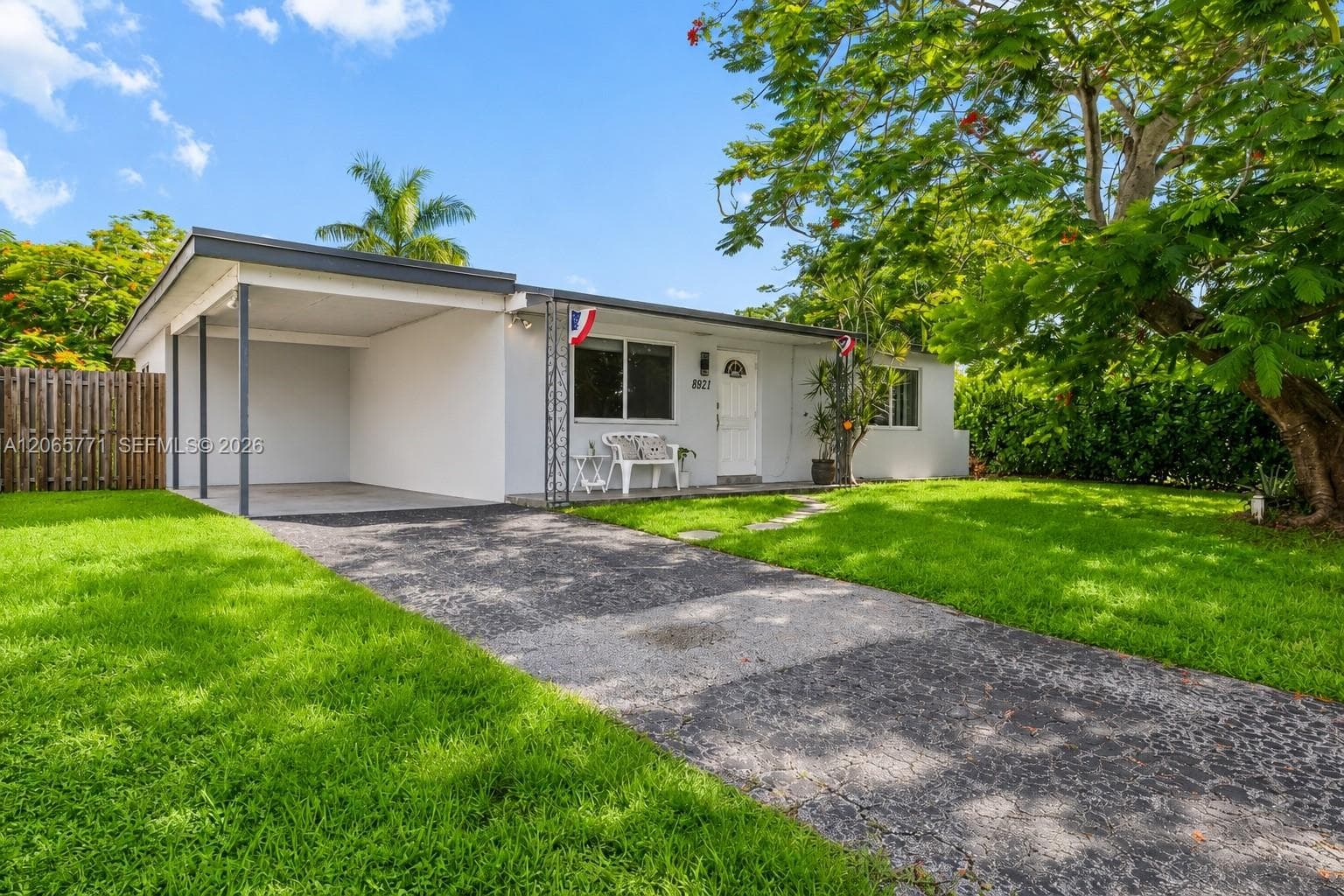 Single-family home at 8921 NW 26th Pl, Sunrise, FL