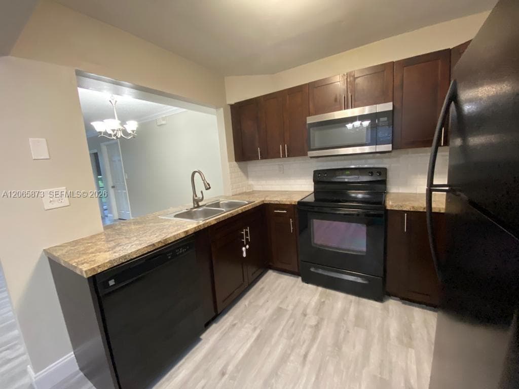 Condo at 446 NE 210th Cir Ter, Miami — photo 1