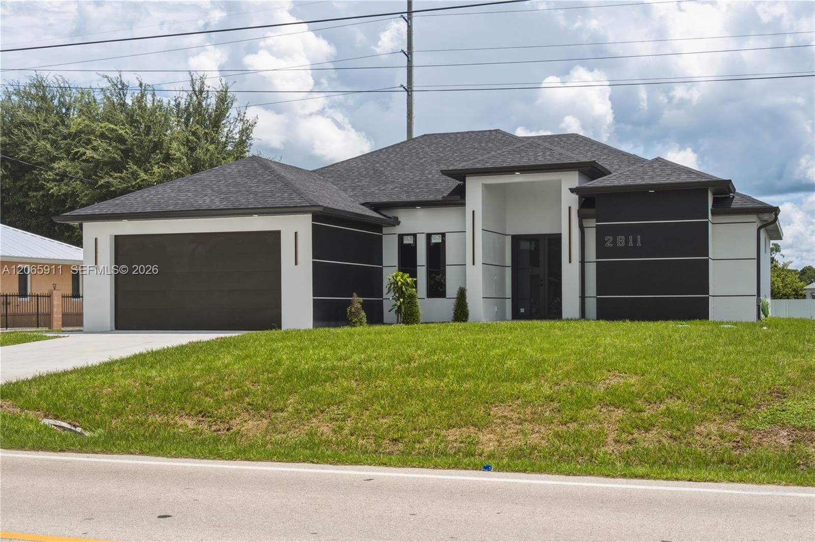 Single-family home at 3011 23rd st sw, Lehigh Acres, FL
