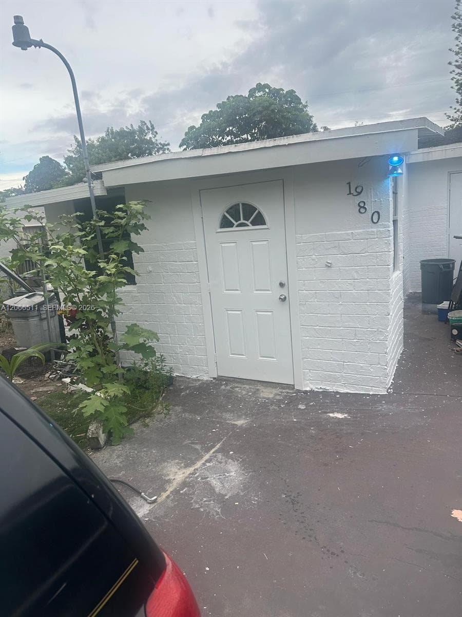 Single-family home at 1980 Service Rd, Opa-Locka — photo 1