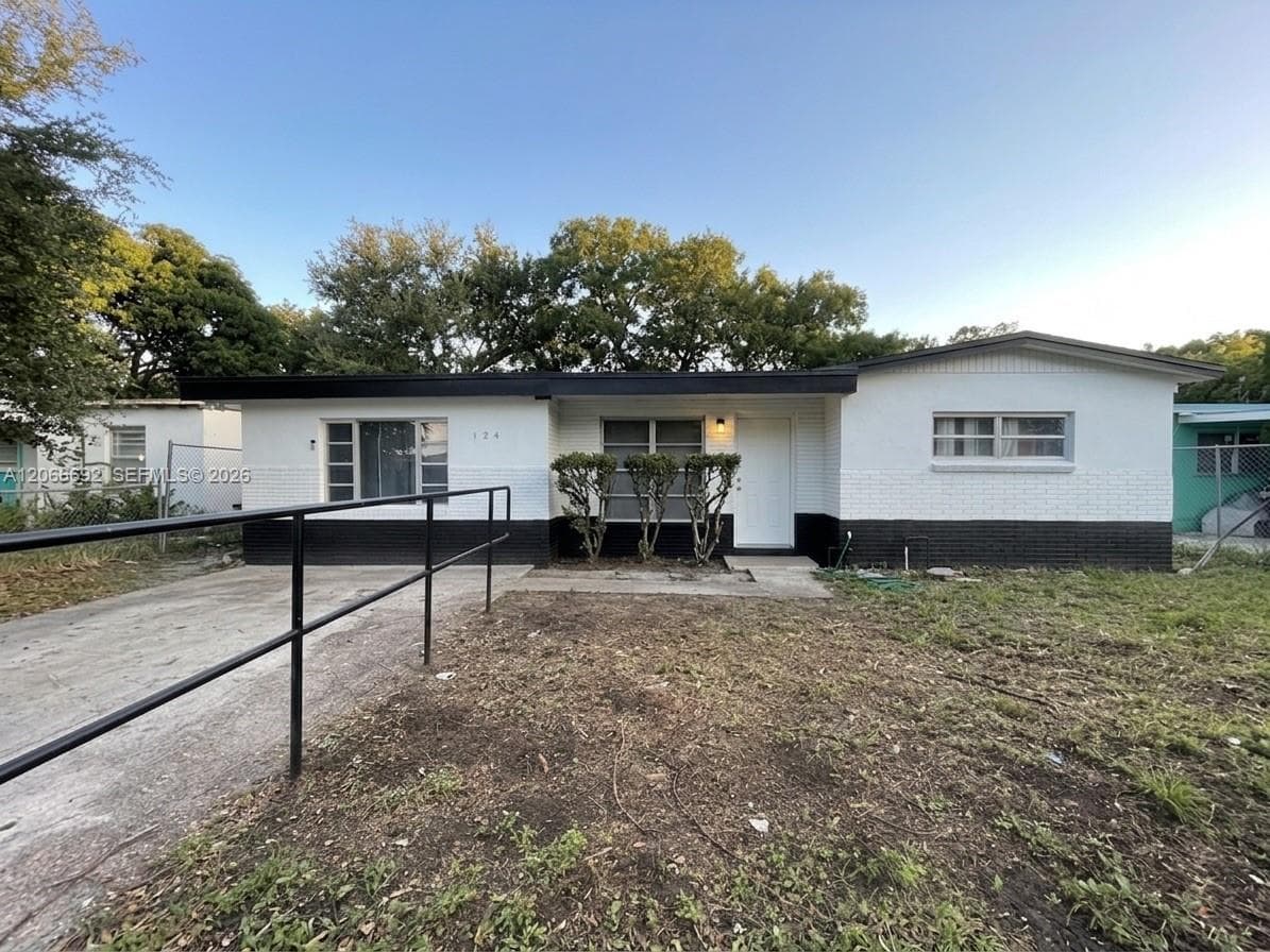 Single-family home at 14241 NW 23rd Pl, Opa-Locka, FL