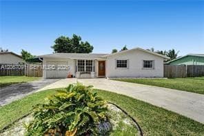 Single-family home at 6327 NW 19th Ct, Margate, FL