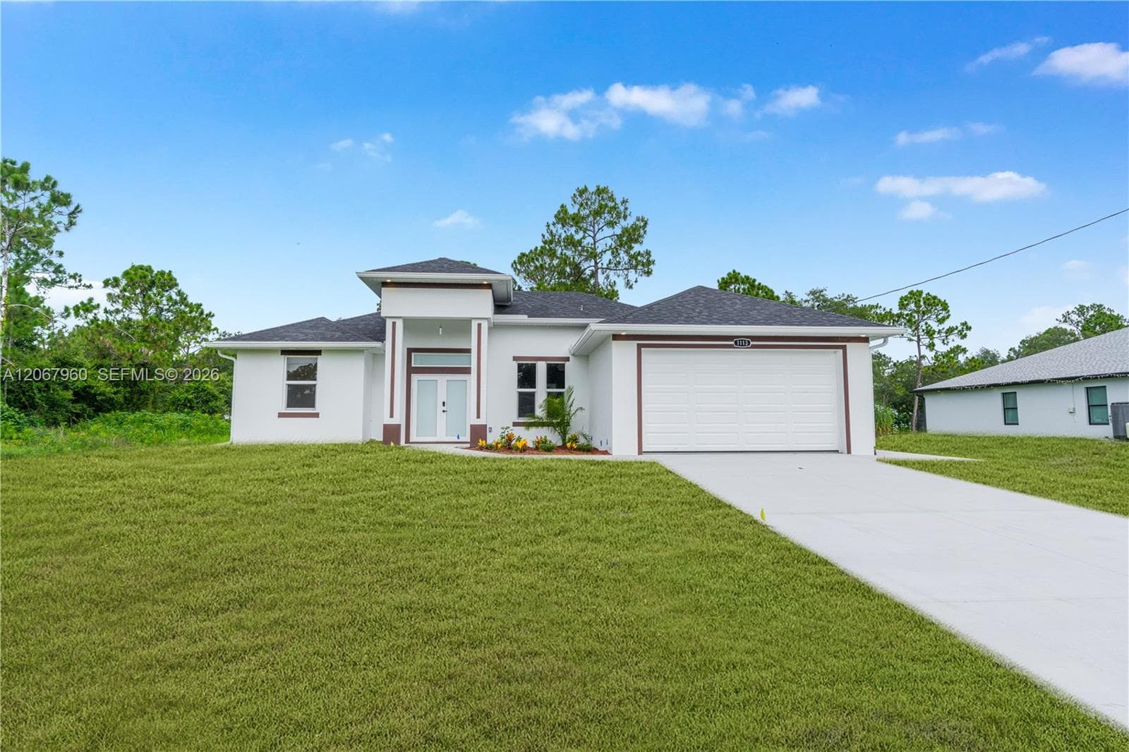Single-family home at 1113 Henry Ave, Lehigh Acres, FL