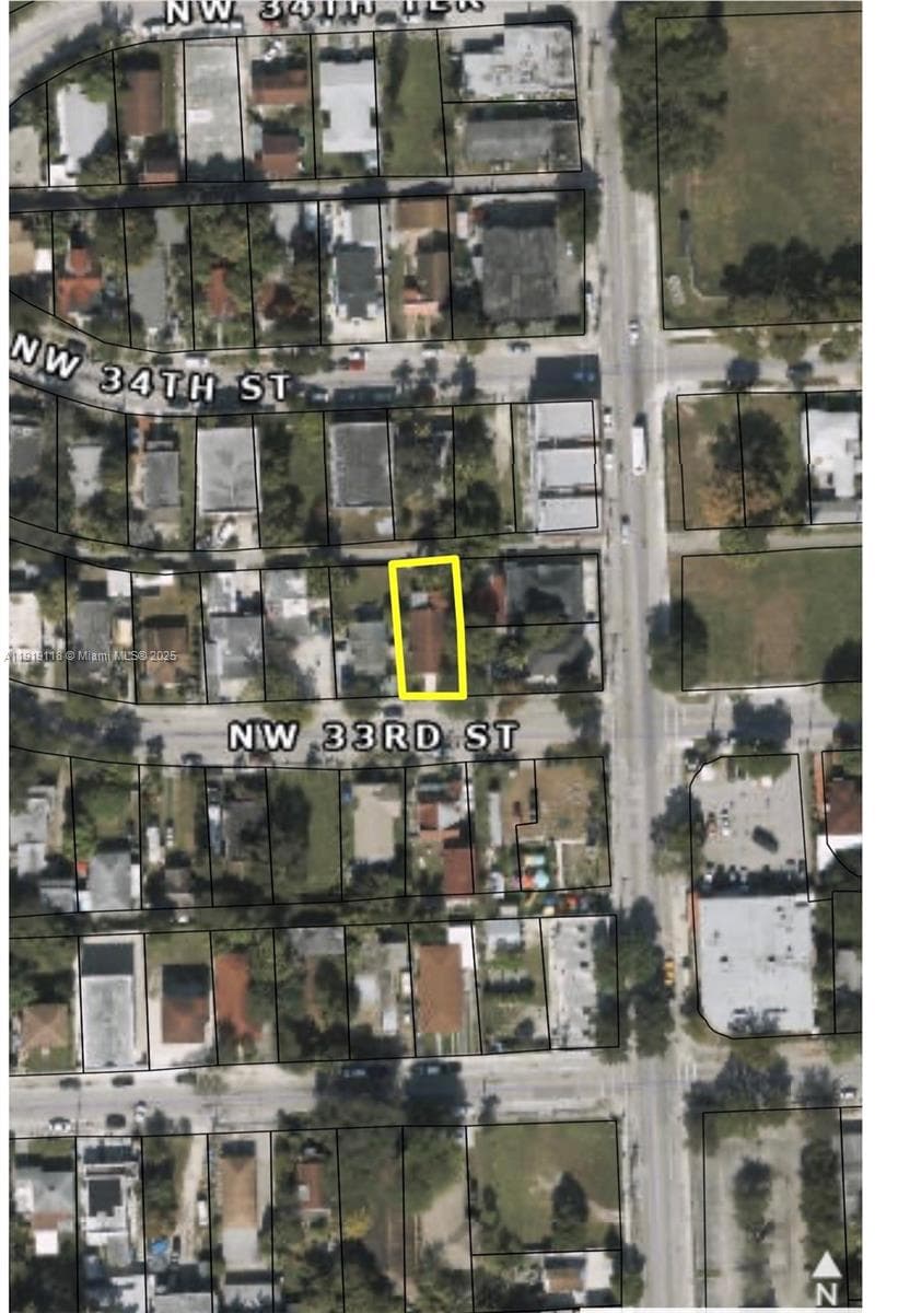 Single-family home at 221 NW 33rd St, Miami, FL