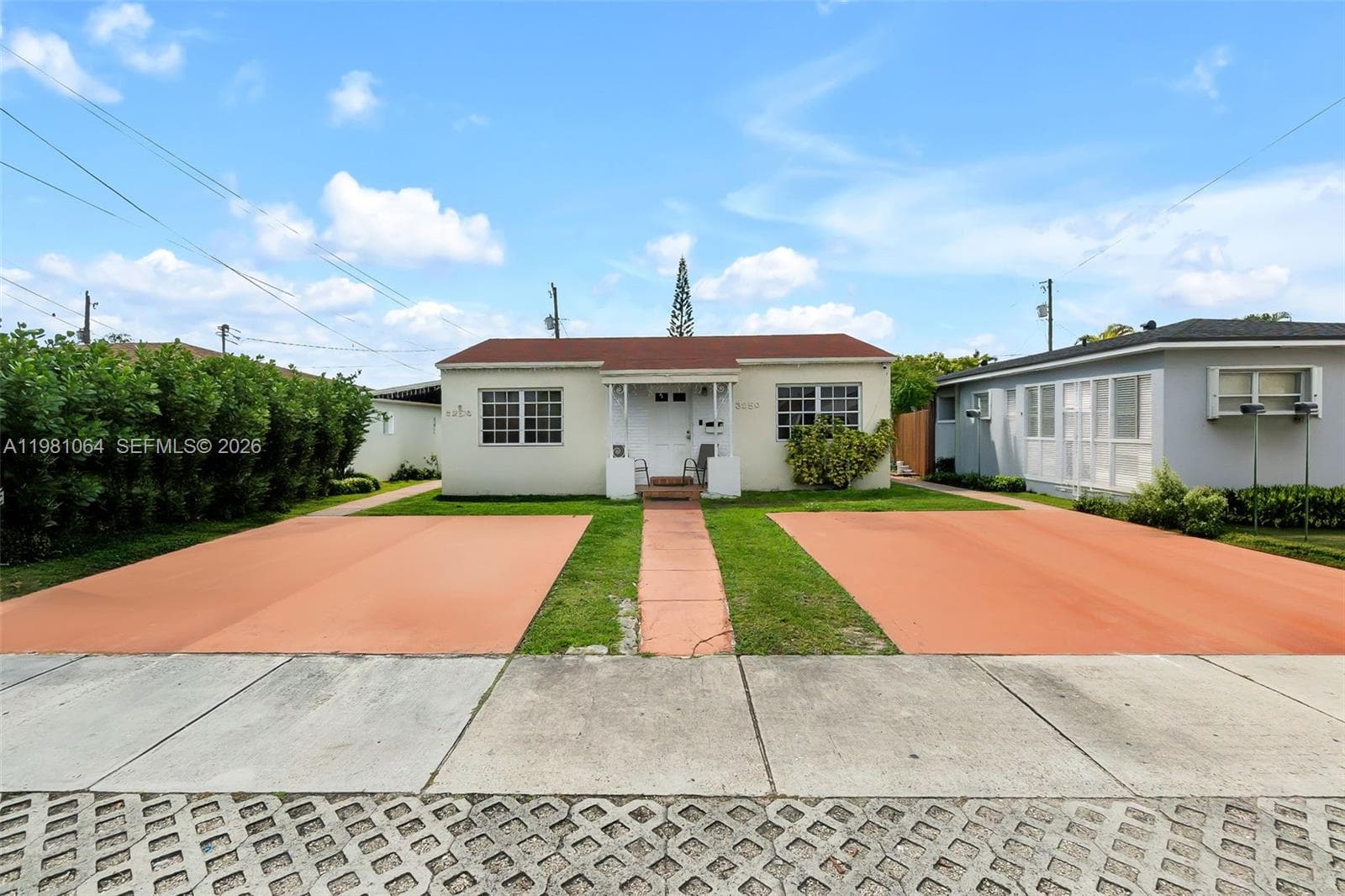 Single-family home at 3250 NW 14th Ter, Miami, FL