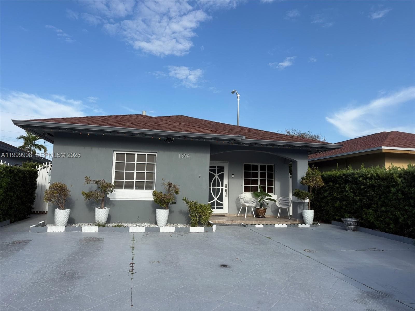 Single-family home at 1394 W 30th St, Hialeah, FL