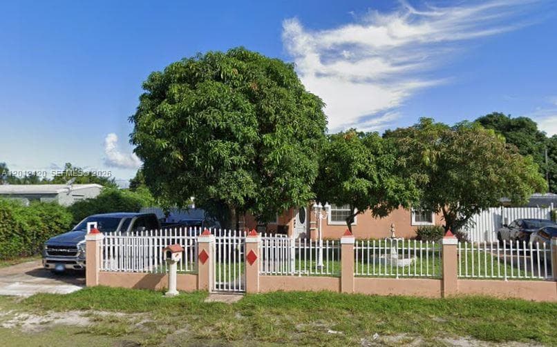 Single-family home at 1725 NW 121st St, Miami, FL