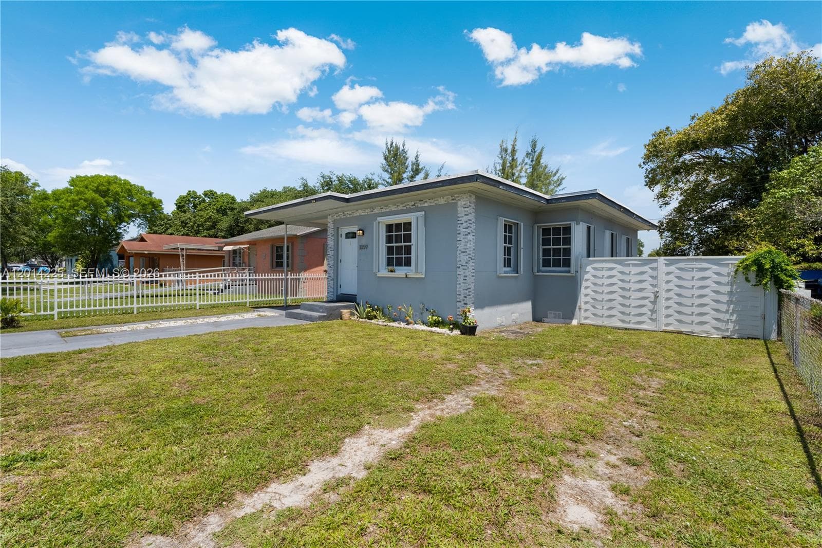 Single-family home at 1059 NW 77th St, Miami, FL