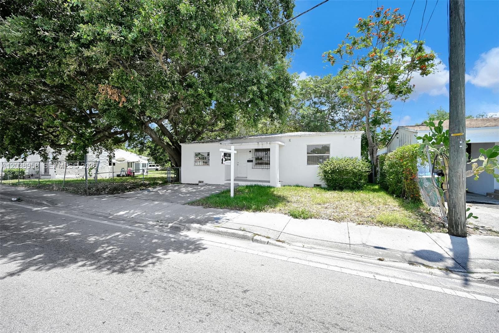 Single-family home at 5511 NW 12th Ave, Miami, FL